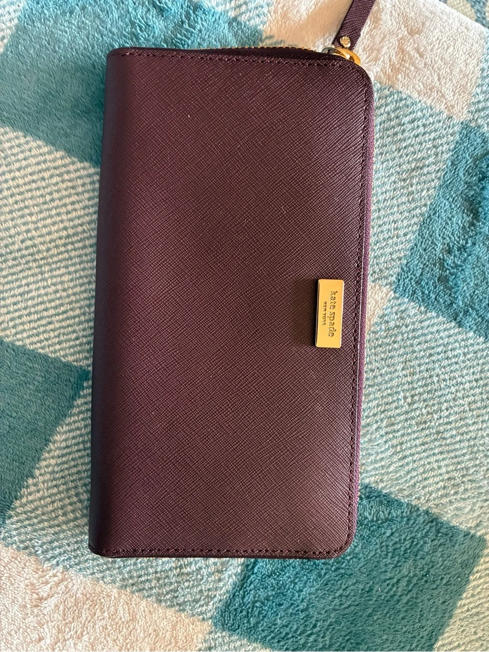 kate spade plum/burgundy zip-around card wallet with gold logo